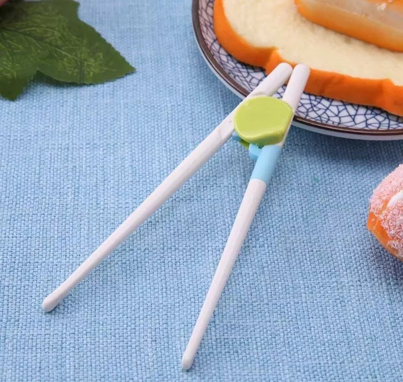 Children Training Chopsticks